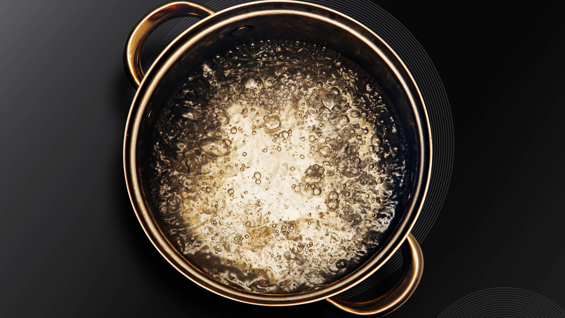Stock image of boiling pot of water
